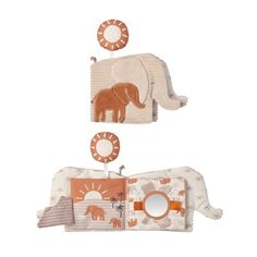 an elephant and giraffe themed baby crib bedding set with matching accessories