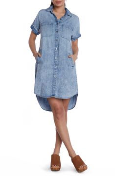 This lightweight denim shirtdress is designed in a classic straight silhouette with short sleeves and a rounded high-low hem. Front button closure Spread collar Short sleeves Chest patch pockets; side-seam pockets 50% cotton, 50% lyocell Machine wash, tumble dry Imported Summer Button-up Chambray Shirt Dress, Trendy Cotton Short Sleeve Shirt Dress, Casual Washed Blue Chambray Denim Dress, Denim Blue Short Sleeve Shirt Dress For Spring, Denim Blue Chambray Short Sleeve Dress, Short Sleeve Denim Blue Cotton Shirt Dress, Denim Blue Cotton Short Sleeve Shirt Dress, Chambray Short Sleeve Dress With Pockets, Denim Blue Cotton Shirt Dress With Short Sleeves