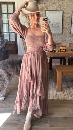 How cute is this Free People maxi dress? With its Western-inspired style and boho chic vibes, this flowy dress is a must-have for anyone who loves to mix comfort and fashion. Perfect for both spring and summer outfits! I love that it's versatile enough to rock anywhere from vacations to casual outings. I paired it with a country hat and some stylish boots. How would you style it? Shop this dress and get into the Nashville spirit now! Hunter Premo. Maxi Dress Nashville Outfits Boho Country Bridesmaid Dress, Farm Wedding Dress Guest, Boho Styled Shoot, Boho Romantic Outfits, Summer Country Wedding Outfit Guest, Cowgirl Bridesmaid Dresses, Nashville Wedding Guest Outfit, Western Wedding Outfits Guest Summer, Quince Outfit Ideas Guest