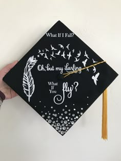 a graduation cap that says, what if i fall? oh but my daddy?