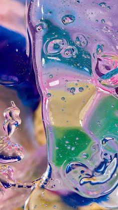 an image of colorful liquid in the air