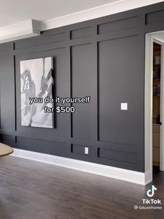 an empty room with gray paneling and white trim on the walls that says, you did it yourself for $ 500