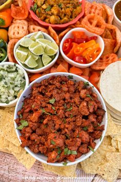 mexican food including tortilla chips, salsa and guacamole