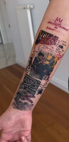 a person's arm with some writing on it and the words written in different languages