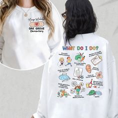 a woman wearing a white sweatshirt with the words what do i do on it