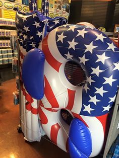 an inflatable blow up balloon with american flag colors and stars on the side