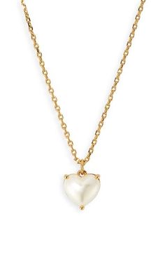 A cubic zirconia heart inspired by your birthstone centers this pendant necklace with love. 16" length; 1" - 3" extender; 1/4"W x 1/4"L pendant Goldtone plate/cubic zirconia Imported Kate Spade Heart Necklace, Luxury Kate Spade Necklaces For Women, Luxury Kate Spade Necklace For Gift, Engraved Pendant Necklace, White Heart Necklace, Heart Pearl Necklace, Pearl Heart Necklace, Dream Wishlist, Kate Spade Heart