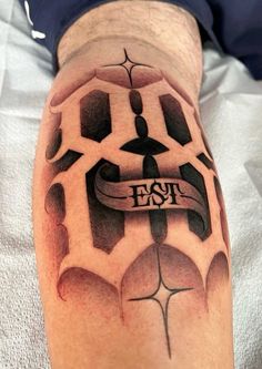 a man's leg with a tattoo on it that says fast and the letters are in black ink