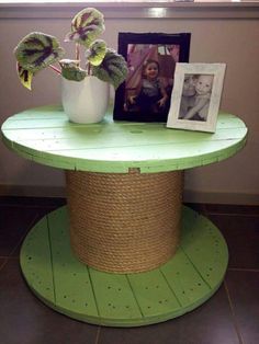 a round table with a plant on top