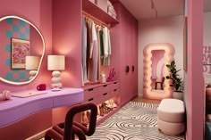 a bedroom with pink walls, purple furniture and a large mirror on the wall above it