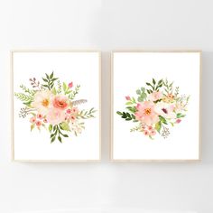 two floral prints hanging on the wall