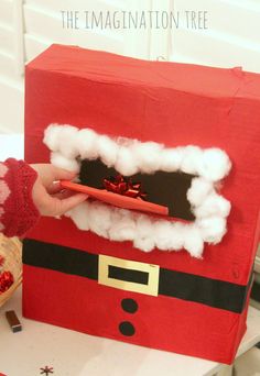 Santa mail box in the Christmas writing area Santa Claus Mailbox, Christmas Grotto Ideas, Christmas Eyfs, Eyfs Christmas, Christmas Literacy Activities, Christmas Fayre Ideas, Santas Grotto, Christmas Grotto, Christmas Literacy