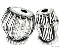 two silver colored african drums sitting side by side