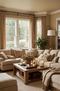 a living room filled with furniture and lots of windows