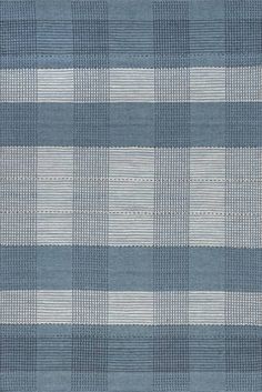 a blue and white checkered rug