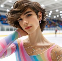 a woman with short hair wearing a colorful dress