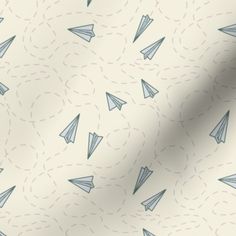 an image of a pattern with paper airplanes on it's back drop in the sky