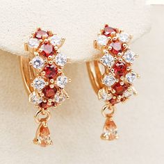 SPECIFICATIONS Style: TRENDY Shape\pattern: Round Metals Type: Copper Material: Cubic Zirconia Fine or Fashion: Fashion Earring Type: Hoop Earrings Red Hoop Earrings, Pageant Earrings, Flower Cross, Gem Earrings, Luxury Earrings, Women Earrings, Party Earrings, Topaz Earrings, Gold Filled Earrings