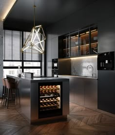 a modern kitchen with an island in the middle and wine racks on the wall behind it