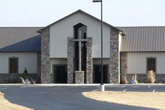 a church with a cross on the front