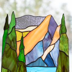 In case you are looking for an elegant item of decor for your home, here it is 🙌 Such marvellous stained glass panel depicting animal in the forest would perfectly complement the interior and make it even more stylish and elegant 🤩😌 This table decor is handcrafted according to the L.C. Tiffany technique of copper foil, during which we refer to only the top-quality materials, such as: • Stained Glass • Tin• Copper Foil• Black Patina ⠀ We advise you to wipe stained glass products with a wet cloth only. ⠀ Be sure that you will get your order in its entirety and good condition as each stained glass panel is packed safely into a brand box. ________________ Please, feel free to share your ideas with us. We are looking forward to creating CUSTOMISED stained glass masterpieces for you! Forest Table Decor, Animal In The Forest, Stained Glass Forest, Deer In Forest, Pic Candle, Mountain Pictures, Glass Products, Mosaic Table, Stained Glass Panel