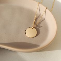 Coin Necklace - Token Jewelry - Eau Claire Jewelry Store - Local Jewelry - Jewelry Gift - Women's Fashion - Handmade jewelry - Sterling Silver Jewelry - Gold filled jewelry - Jewelry store near me Everyday Hammered Medallion Jewelry, Polished Coin Necklace With Round Pendant For Gift, Polished Finish Coin Necklace With Round Pendant For Gift, 14k Gold Coin Necklace With Polished Finish, Polished Finish Round Pendant Coin Necklace As Gift, Hammered Round Necklaces For Everyday, 14k Gold Hammered Round Pendant Jewelry, Everyday Engraved Yellow Gold Coin Necklace, Hammered Round Disc Coin Necklace As Gift