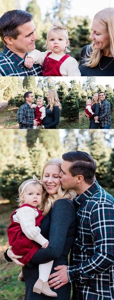 a man and woman holding a baby in their arms while they smile at each other