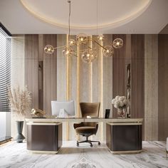 an elegant office with marble floors and walls, along with a chandelier that hangs from the ceiling