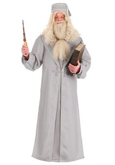 a man dressed as an old wizard holding a wand and wearing a book in his hand