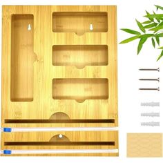 a bamboo box with tools in it next to a bamboo plant and some other items