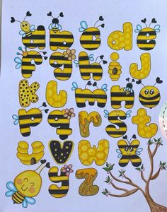 bees and honeycombs on white paper with the word bee written in large letters