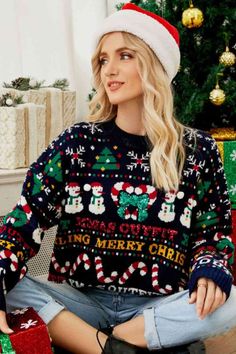 Sparking Xmas Bold Colorful Knit Round Neck Christmas Holiday Oversized Winter Sweater This festive knit sweater offers functionality with a fun playful print.Candy canes, trees and snowmen with snowflakes all in a stripe formation.Features 2 candy canes in the shape of a heart along with a green sparkling bow with XMAS OUTFIT in red.Darling Merry Christmas is written out in a contrasting gold.Classic round neckline, long sleeves and bottom all accented with a ribbed hem.Perfect pullover for pai Casual Sweaters Women, Loose Knitwear, Xmas Outfit, Loose Fashion, Sequin Sweater, Casual Sweater, Elegant Casual, Drop Shoulder Sweaters, Matching Family Outfits