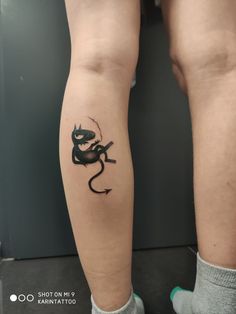 a person with a tattoo on their leg