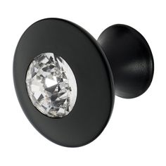 a black door knob with a diamond in the center