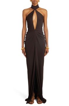 Fluid jersey lends beautiful drape to a floor-pooling gown topped with a clavicle-baring mock neck and detailed with sultry cutouts at the front and back. 65" length (size 40It) Hidden back zip; keyhole with hook-and-eye closure Mock neck Sleeveless, with cutaway shoulders Lined 82% viscose, 18% polyamide Dry clean Made in Italy Designer Clothing Tom Ford Gown, Banquet Outfit, Dark Brown Dress, Mob Dress, Georgette Skirt, Cape Gown, Designer Clothing Brands, Wardrobe Pieces, Cashmere Poncho