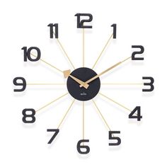 a black and gold clock with numerals on the face is shown against a white background