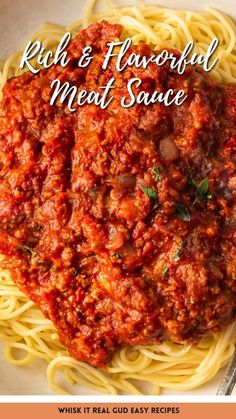 a plate of spaghetti with sauce on it and the words, rich & flavorful meat sauce