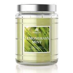 a glass jar filled with lemongrass mint scented candle on a white background, front view