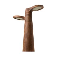 a wooden lamp with two lights on it