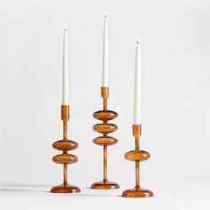 three candles sitting on top of each other