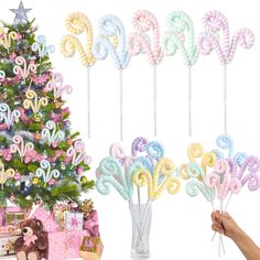 a christmas tree decorated with lollipops and candy canes in front of it