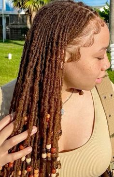 #locstyles #locs #locstylesforwomen #locjourney #dreadstyles Neat Locs Women, Styled Dreads Black Women, Chocolate Locs Black Women, Micro Locs Dyed, Dyed Locs Brown, Small Long Locs, Medium Small Locs, Brown Locs With Highlights, Color 30 Locs