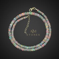 AAA White Ethiopian Opal Beaded Necklace, Smooth Rondelle Beads Necklace, Multi Fire Beads Necklace, Ethiopian Opal Beads Strand Necklace This necklace is perfect for yourself, giving as a special gift, or a bridesmaid necklace So simple and yet will be stunning on your neck! Stone - Ethiopian Welo opal Type - 100% genuine Finish - Smooth Size - 3 to 4 MM- 4 to 5 MM- 5 to 6 MM Adjustable Length - 1.5 Inch These Handmade Opal Beaded Jewelry are unique and exclusive to Aimstones shop. You will not Cheap Festival Necklaces With Oval Beads, Luxury Opal Round Beads Jewelry, Opal Choker, Fire Opal Jewelry, Fire Opals Jewelry, Jewelry Bridesmaid, Local Jewelry, Opal Beads, Necklace White