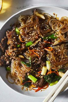 Gluten-free sweet potato noodles are tossed with steak, mushrooms, and spinach to make this classic Korean dish. Get the recipe at Food & Wine. Korean Japchae, Steak Mushrooms, Mushrooms And Spinach, Gluten Free Sweet Potato, Potato Noodles, Sweet Potato Noodles, Asian Noodles, Food Recepie