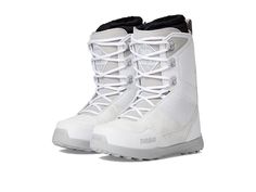 a pair of white snow boots on a white background