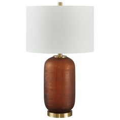 Clearly a contemporary choice. This table lamp wows with understated elegance, thanks to its rich amber-hued glass base enhanced with goldtone accents. Whether your decor is modern or eclectic, you'll love how it lightens the mood and brightens a space. Accent Lighting, Glass Table Lamp, Nebraska Furniture Mart, Understated Elegance, Table Lamp Lighting, Glass Table, Nebraska, Amber, Gold Tones