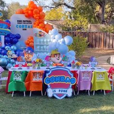 a birthday party with balloons and decorations