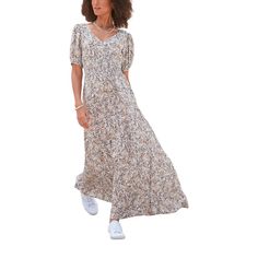 This beautiful, flowy maxi dress in a floral print is a must-have for your wardrobe! * Smocked elastic waist for a flattering fit * Puffed short sleeves with elastic at the ends * Wide v-neckline * Maxi length * Print may vary * 100% Sustainable Viscose. Imported. * Machine washable High Waist Maxi Dress, Women Dresses Casual Summer, Sundress Summer, Maxi Dress Floral, Short Sleeve Maxi Dresses, Flowy Maxi Dress, Floral Print Maxi Dress, Striped Maxi, Floral Print Maxi