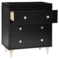 a black dresser with gold knobs on the top and bottom drawers, against a white background