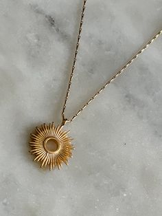 This dainty necklace is a lovely nod to a Monstrance. The radiant sunburst reminds us of the glorious transfiguration of our Lord and that we are each called to be examples of His radiance here on earth. This necklace would also make a lovely gift for First Communion when they are first taking The Eucharist and understanding of His Real Presence, or a great reminder of His Presence as a gift for Confirmation. Also available, are our Adoremus Stud Earrings. The .5" pendant is strung on a 16" barl Sunburst Necklace, The Eucharist, Here On Earth, Eucharist, Confirmation Gifts, First Holy Communion, Baptism Gifts, Our Lord, Sacred Art